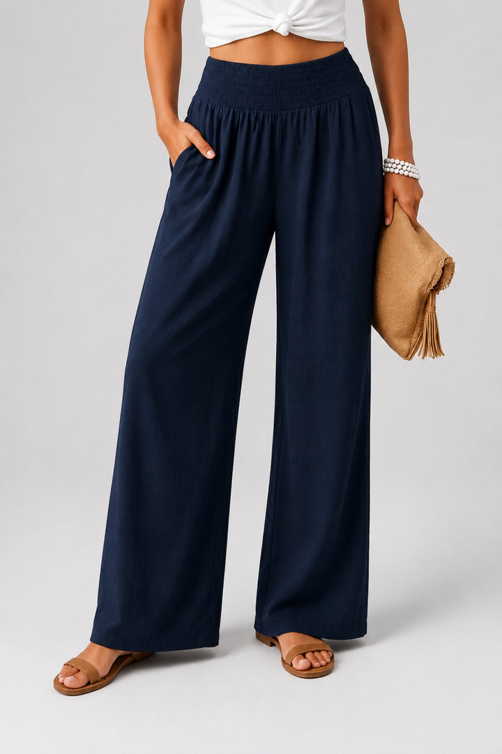 Damenhose aus Leinen mit weitem Bein, hohem, gesmoktem Bund und Taschen