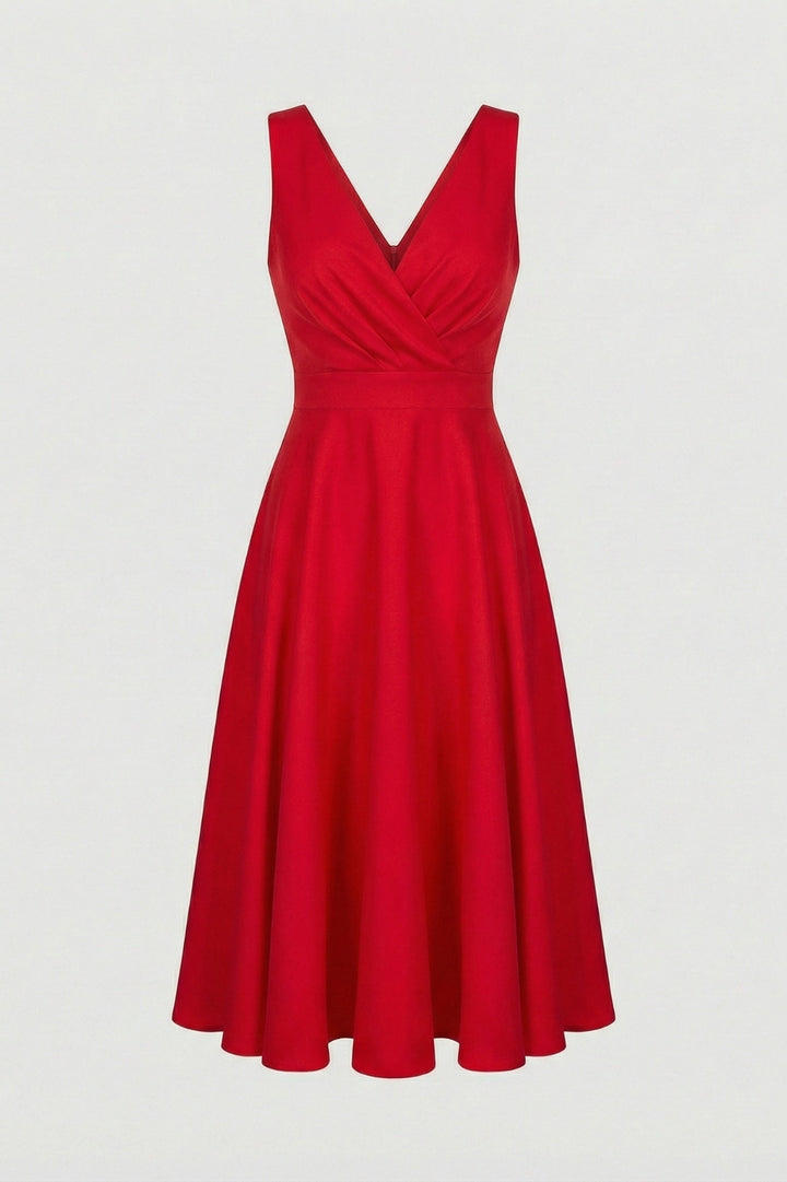 Elegantes, ausgestellt geschnittenes Damenkleid | Midi-Länge in Puderrosa mit gekreuztem V-Ausschnitt, hoher Taille und fließendem Rock
